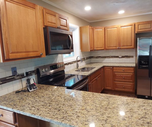 kitchen remodeling complete with new cabinetry and appliances